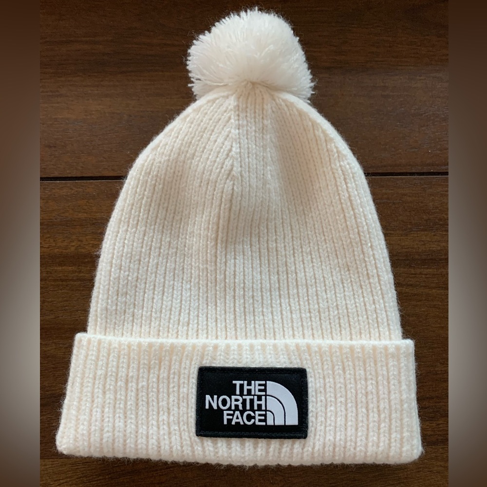 Adult one size white north face beanie.